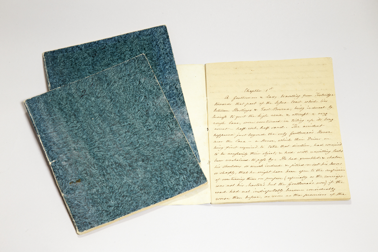 Cassandra's handwritten copy of Sanditon in three green notebooks