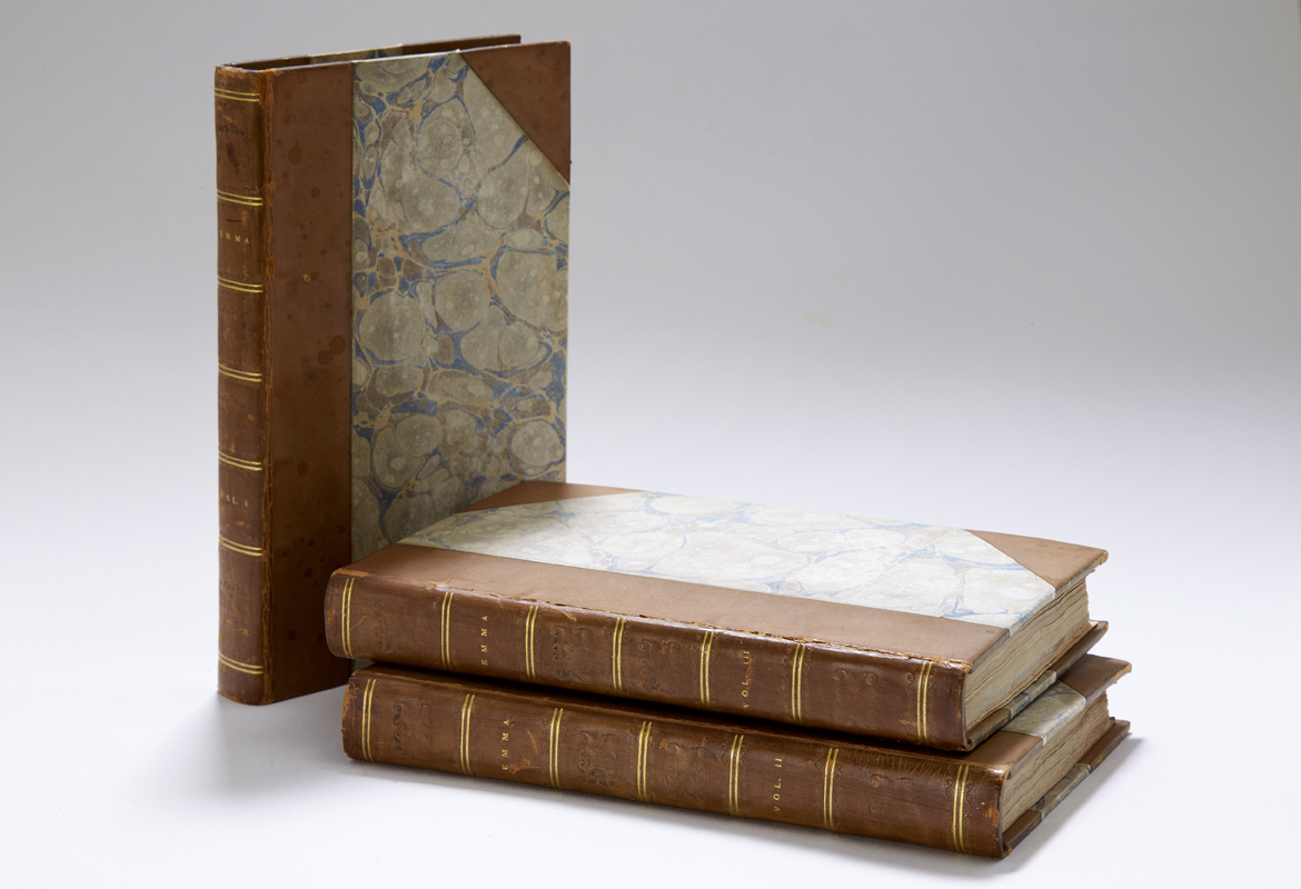 First edition of Emma in three volumes with marbled cover and gilt leather binding