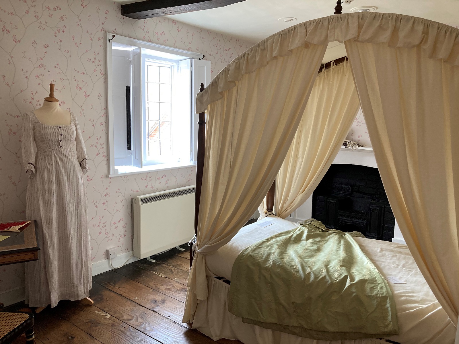 This scene is set in Jane Austen's bedroom at Chawton. The bed is similar in design to Jane’s childhood bed, made to order in 1794 when the Austen family were living in Steventon. Mr Austen placed the order for two beds for Cassandra and Jane, with the Ring Brothers in Basingstoke.
