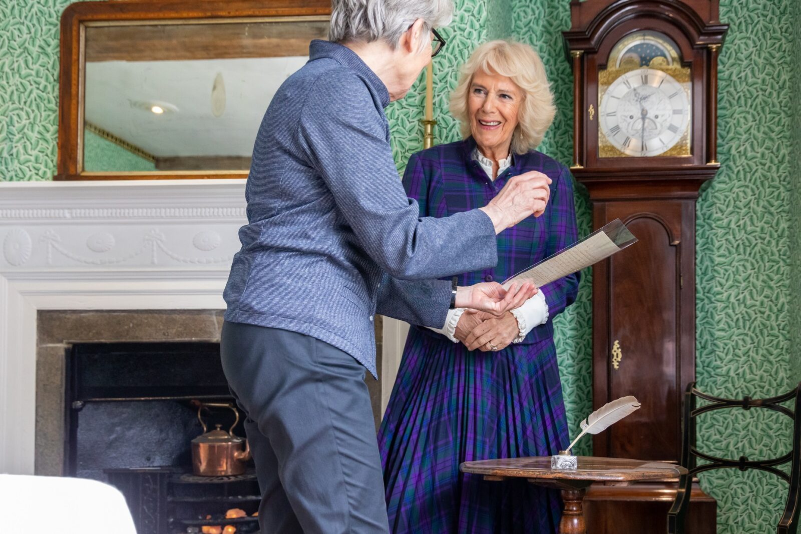 HRH The Duchess of Cornwall with Professor Kathryn Sutherland by Jane Austen's writing table.