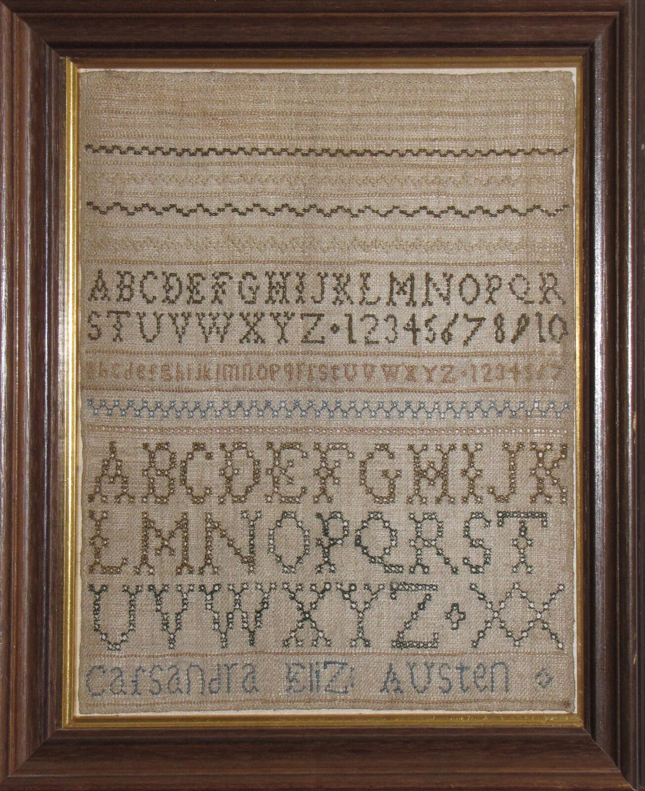 Sampler worked by Cassandra Austen, framed.