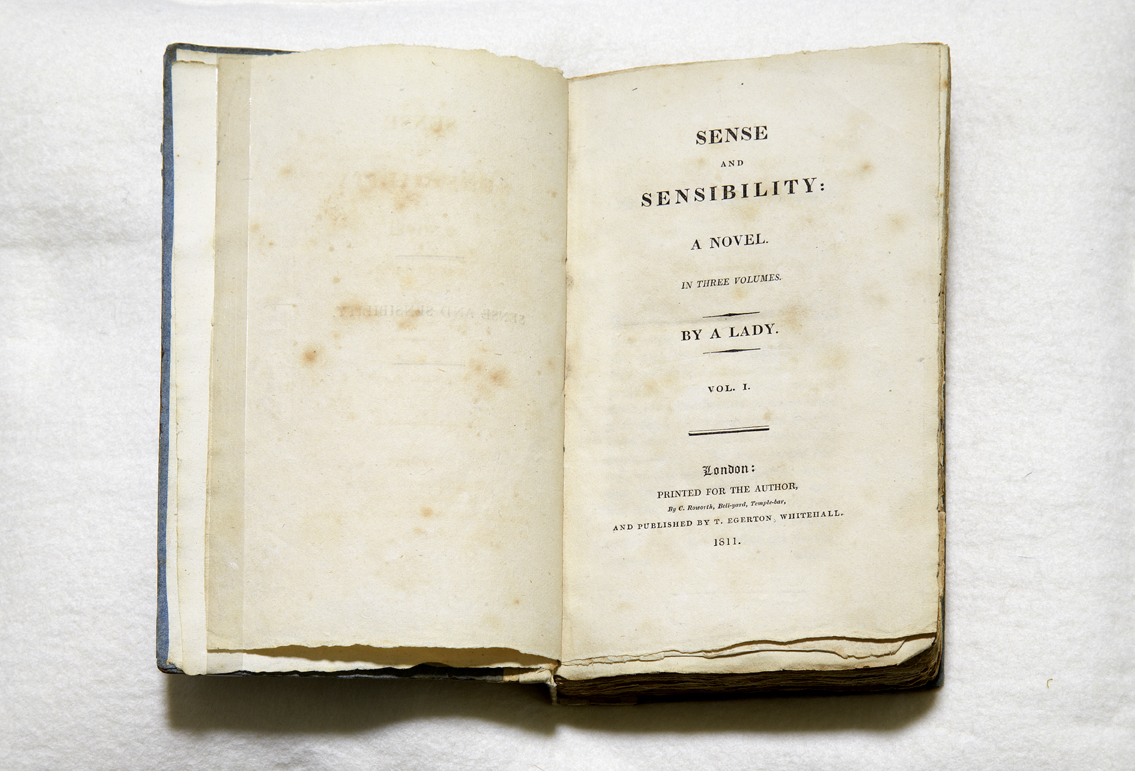 A first edition of Sense and Sensibility, open on the title page