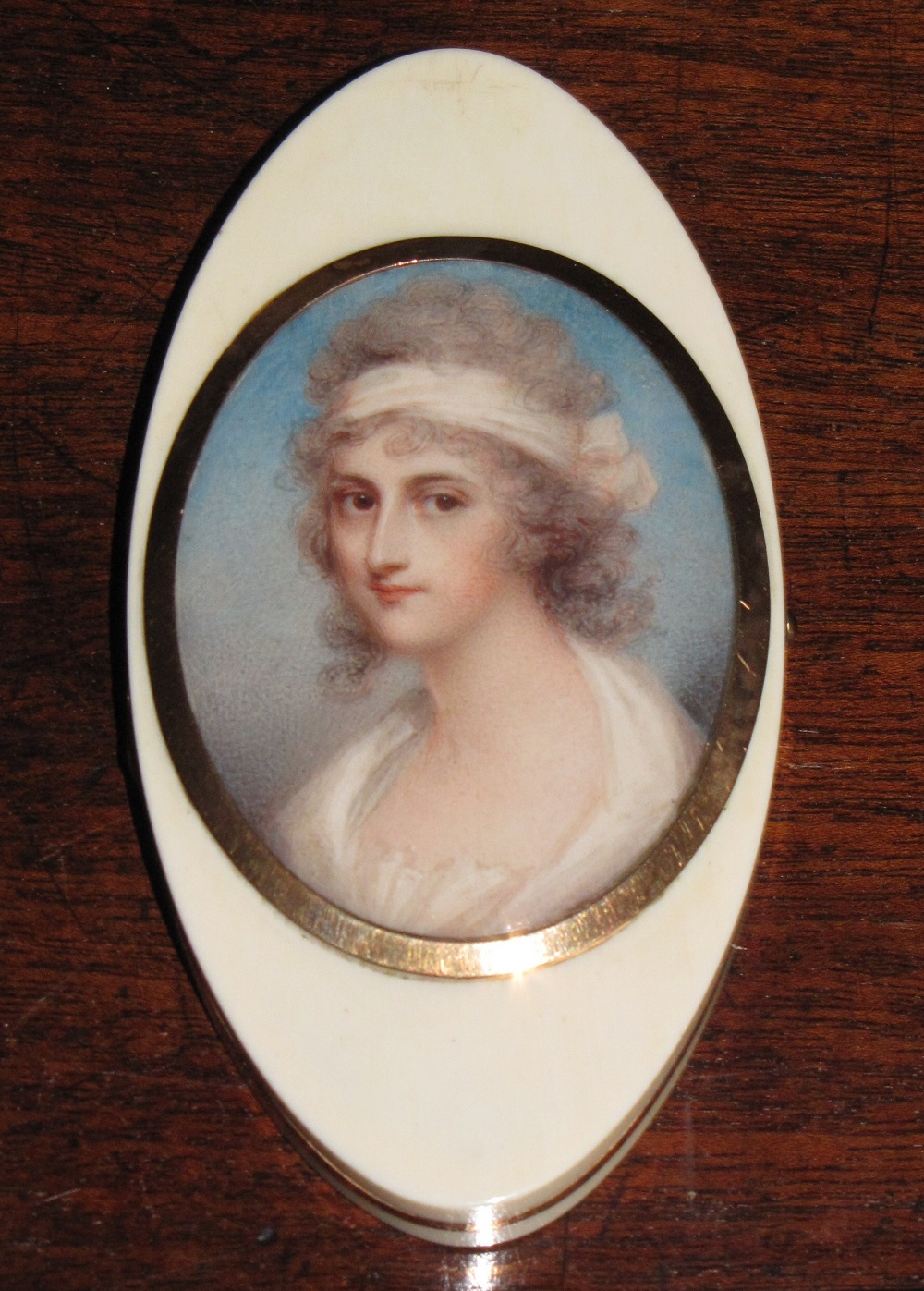 Ivory and gold mounted oval patchbox, the cover inset with a portrait miniature of Elizabeth Austen (nee Bridges)