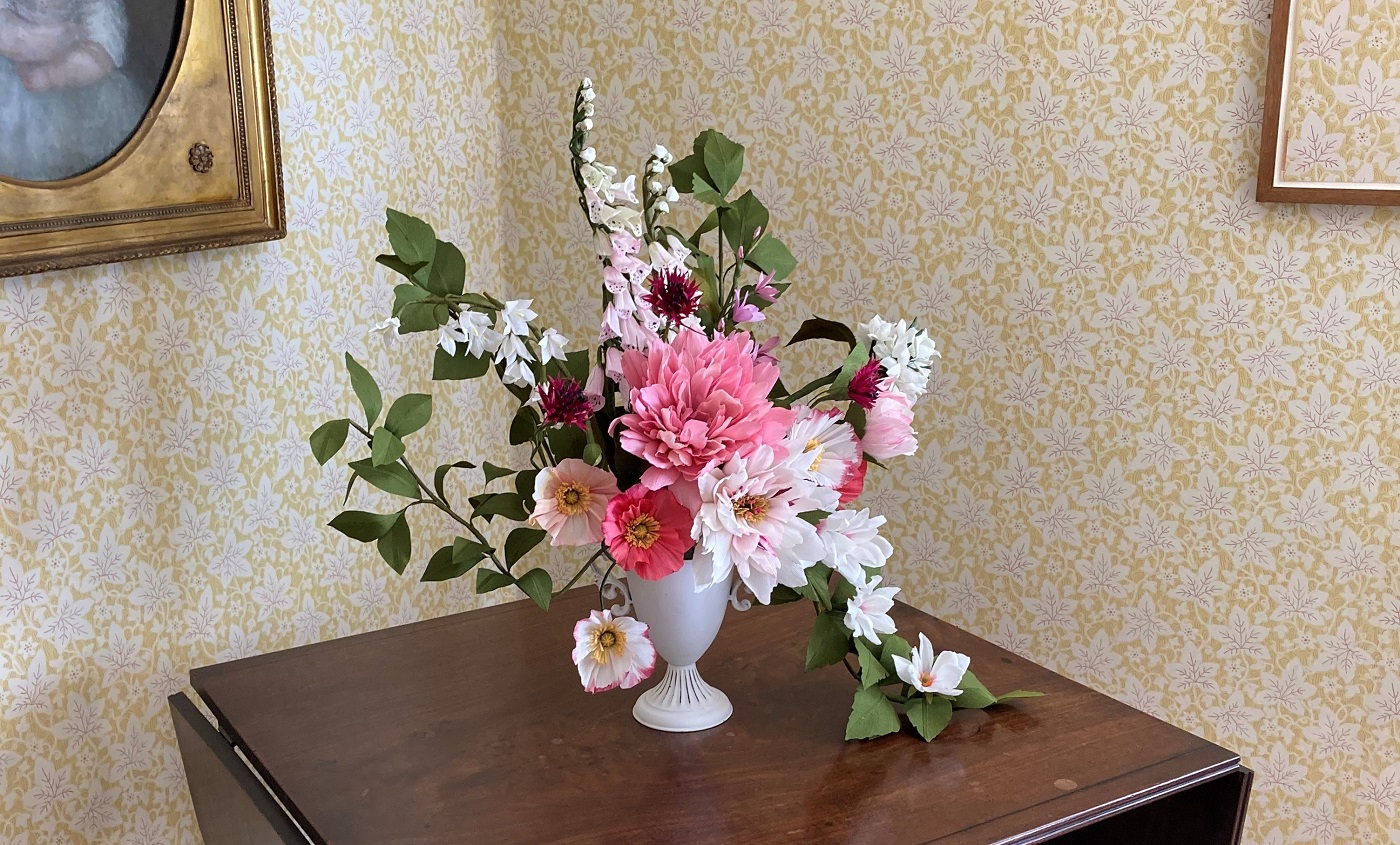Jessie Beaumont's paper flower display in the Drawing Room at Jane Austen's House