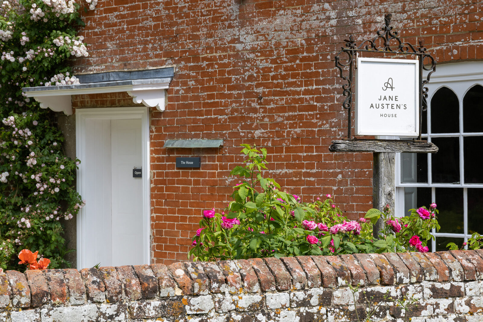 House sign Peeking into the garden at Jane Austen's House cr. Luke Shears.