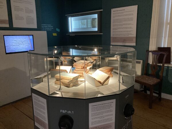 A display case filled with first editions of Jane Austen's novels